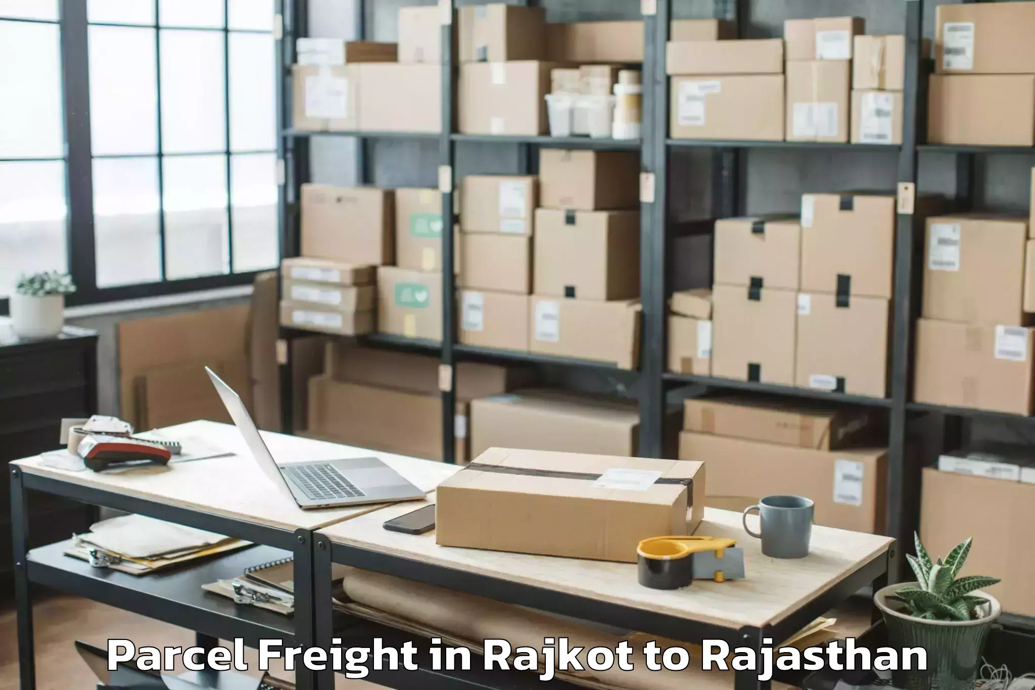 Expert Rajkot to Khetri Parcel Freight